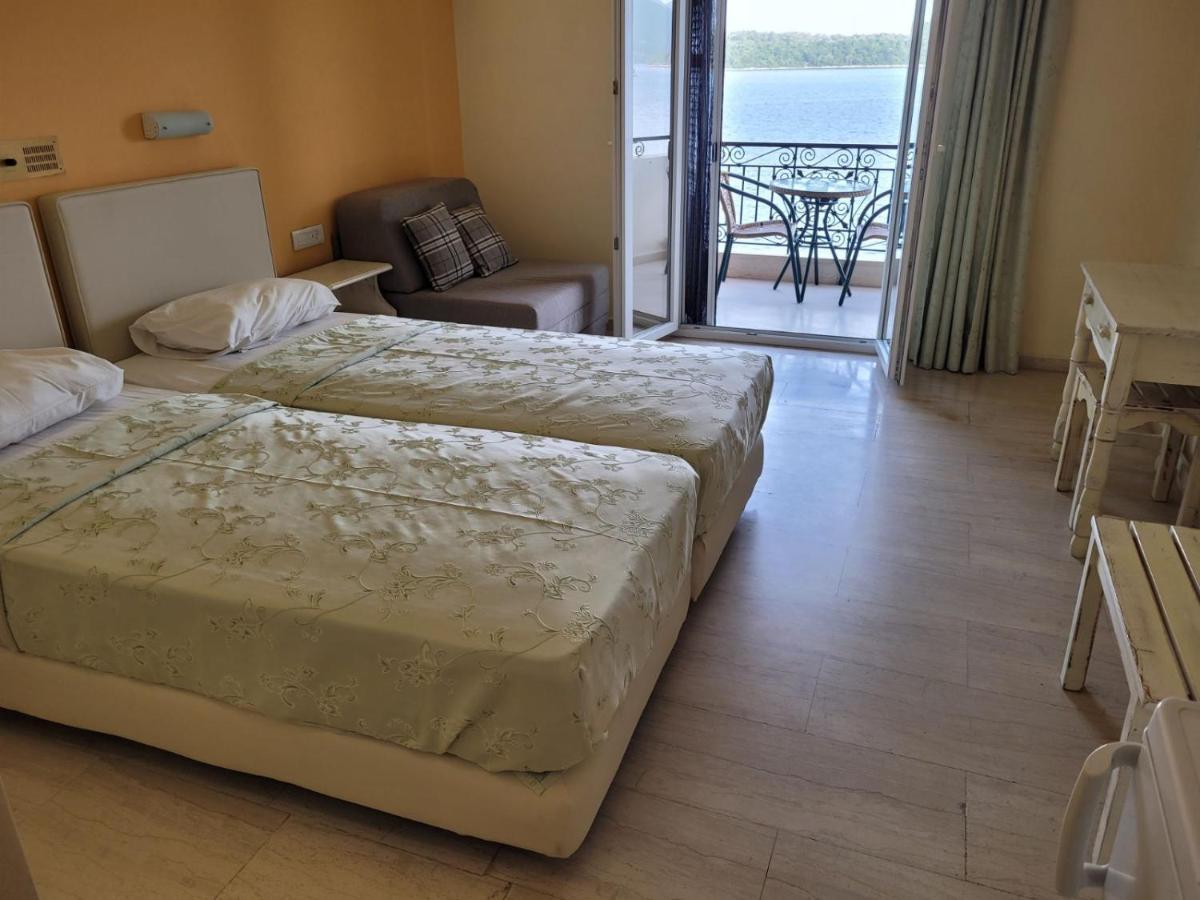 Logan'S Beach Hotel Nydri  Esterno foto