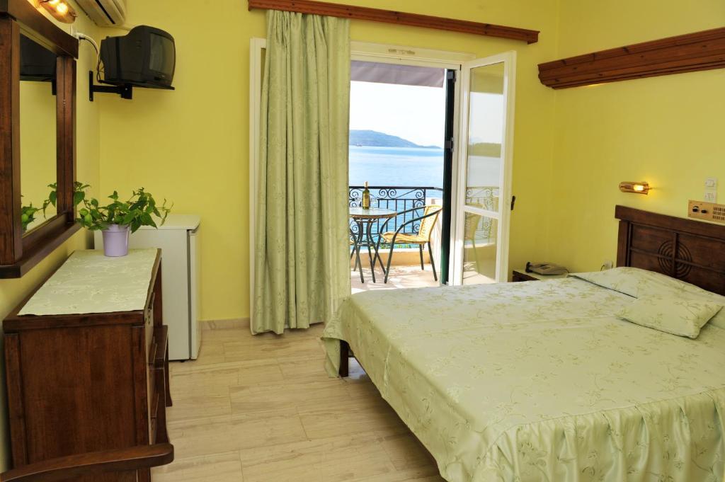 Logan'S Beach Hotel Nydri  Camera foto